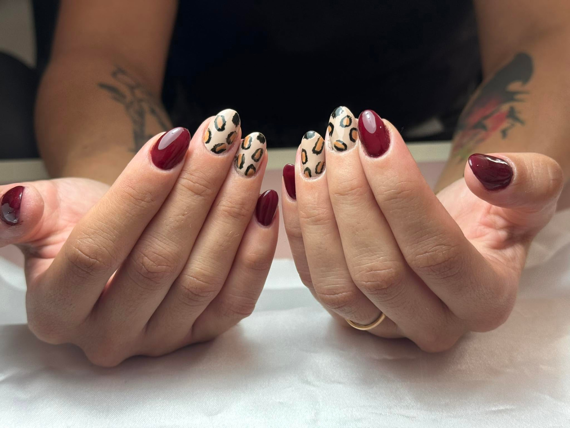 Leopard Print Accent & Deep Wine Gel Set — nail design by LV Hair and Nails